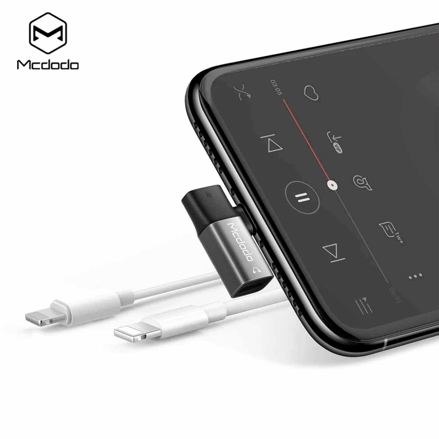 Imagen 2 del producto Adaptador Mcdodo Lightning a DC3.5mm, carga y audio, 2A, compatible iPhone 7 a 14, aleación aluminio, negro