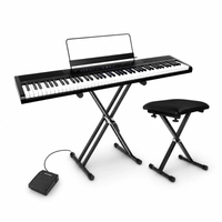Piano digital Alesis Concert Pack, pantalla LED, 88 teclas semicontrapesadas, 10 sonidos, incluye soporte, pedal sustain y asiento, negro